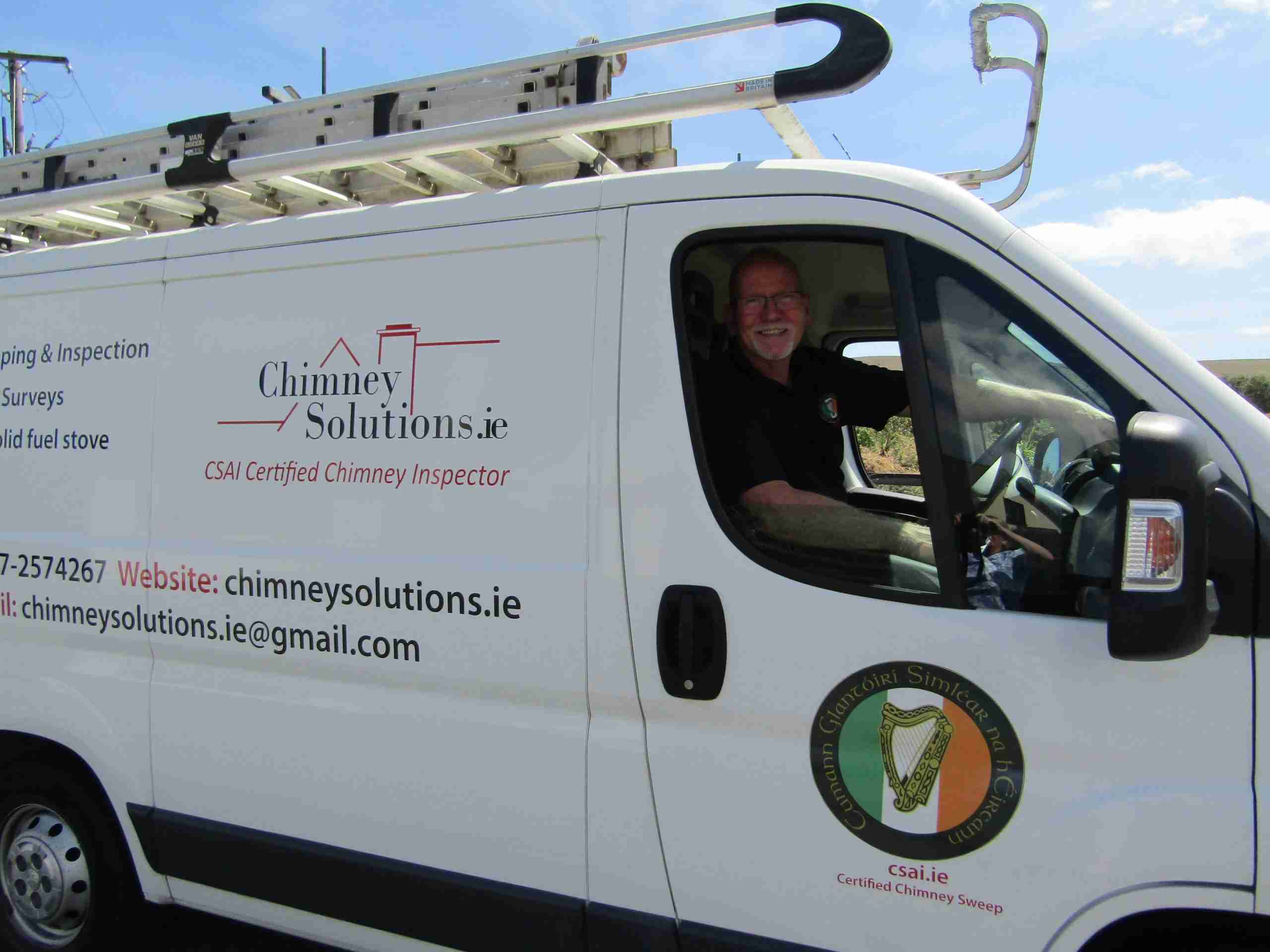 Patrick Cowan pictured in his Chimney Solutions van
